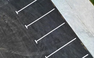 The Small Cracks That Cost Big: Why Parking Lot Repairs Can’t Wait